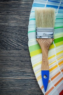 Paintbrushes color pantone fan on wooden board