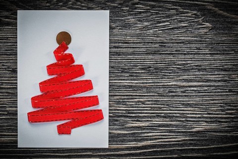Christmas greeting card on wooden board