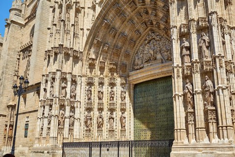 Seville cathedral facade in Constitucion avenue of Sevilla Andalusia Spain