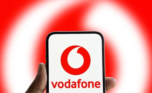 Vodafone logo is displayed on smartphone.