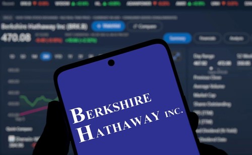 Berkshire Hathaway inc logo is displayed on smartphone. Berkshire Hathaway Inc is an American
