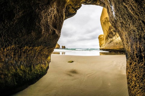 An image of a cave at Tunnel Beach in New Zealand