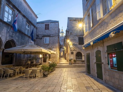 Restaurant tables, old town centre of Korcula, Korcula island, Dalmatia, Croatia, Europe