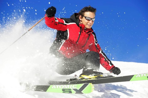 Skier in action, rapid descent on a slope, 30-40years, Alps, Austria, Europe