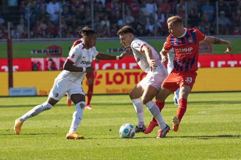 Football match, Junior ADAMU SC Freiburg and Maximilian EGGESTEIN SC Freiburg fighting for the ball