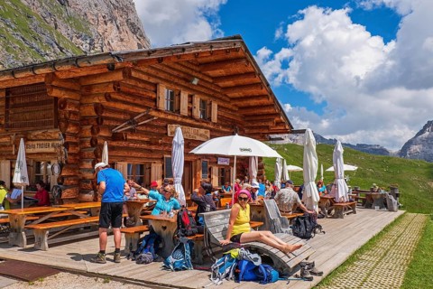 Restaurant with hikers in the Alps