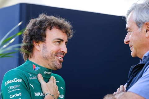 MELBOURNE, AUSTRALIA - MARCH 13: Fernando Alonso of Spain and Aston Martin Aramco F1 Team talks to