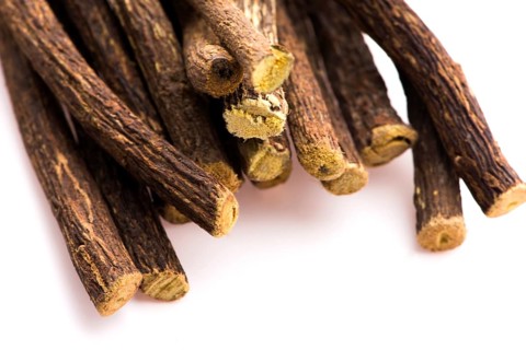 Licorice roots on white background