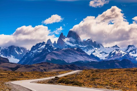 The highway crosses Patagonia and leads to majestic mountains of Fitzroy. The road through desert
