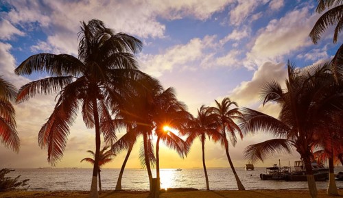 Isla Mujeres island Caribbean beach sunset palm trees Riviera Maya in Mexico