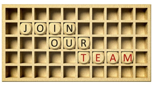 3d rendering of a wooden grid with cubes and the message join our team