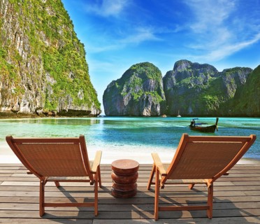 Charming lookout for two. Two convenient comfortable guest sun loungers and a bedside table are
