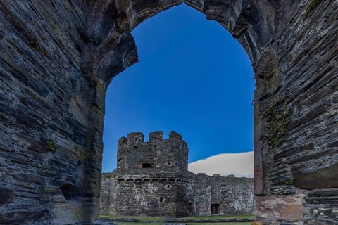 Conwy Castle, view through an arched opening in the castle wall to the tower of the medieval castle