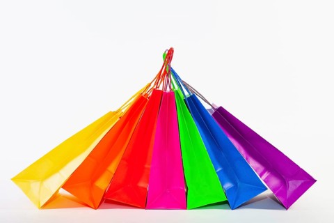 Set of colorful empty shopping bags isolated on the white background. Sale, consumerism,
