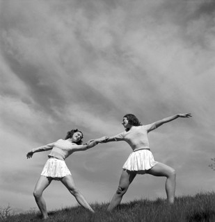 Gymnasts in the 1940s. Lalla Cassels dance troup. Two of the girls are training and poses in a