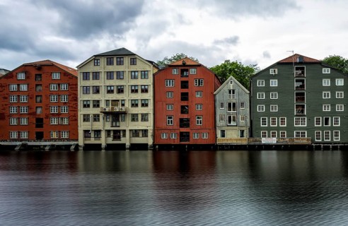 View of warehouses at the Nidelva river in Trondheim, Norway, Europe