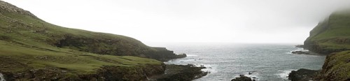 Typical landscape on the Faroe Islands, with green grass and rocks on Suduroy, Suduroy, Faroe