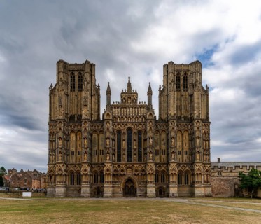 Wells, United Kingdom, 1 September, 2022: view of the two spires and front of the 12th-centruy