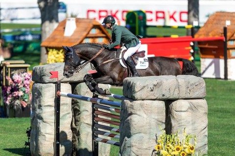 Denis Lynch of Ireland, riding Vistogrand compete in the BMO Nations Cup during the CSIO Spruce