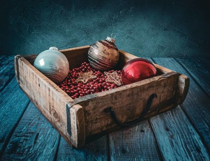 Christmas decorations in an old wooden box