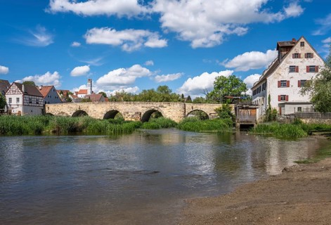 Historic bridge across the river Wörnitz at the city Harburg (Bavaria, Germnay)