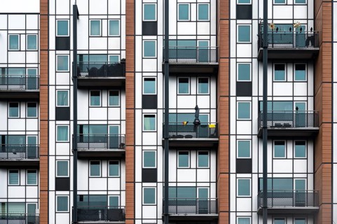 Leuven, Flemish Brabant Region, Belgium, April 1, 2023, Facade with windows and balconies of a