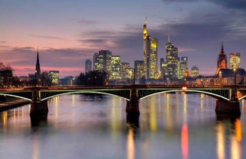 Frankfurt skyline at dusk with Ignatz Bubis bridge, Frankfurt - HDR version - Hesse, Germany