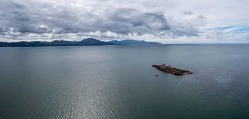 Aerial panorama view of the historic Fenit Lighthouse on Little Samphire Island in Tralee Bay