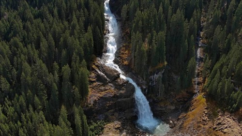 Aerial view of Krimml Waterfalls on sunny day. High Tauern National Park, Austrian Alps, Austria,