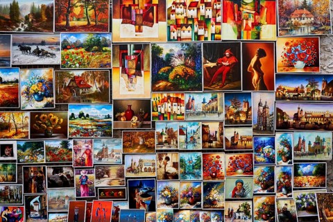 Wall full of oil paintings