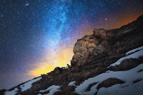 Night scenery done on long exposure. A beautiful Caucasian landscape of red rocks against the