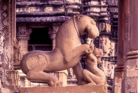 Sculptures of a mythical lion and woman at the Kandariya Mahadeva in Khajuraho, Madhya Pradesh,