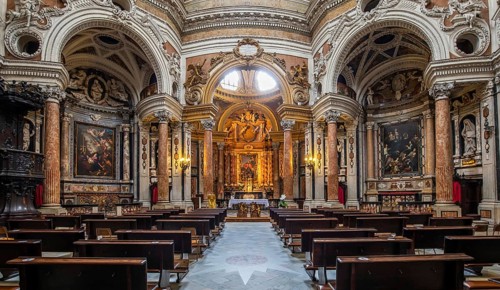 TURIN, ITALY - CIRCA MAY 2021: Antique baroque interior with vintage decoration. Royal Church of