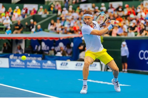 MELBOURNE, AUSTRALIA, JANUARY 16, 2020: Grigor Dimitrov (BUL) hits a backhand to Nick Kyrgios (AUS)