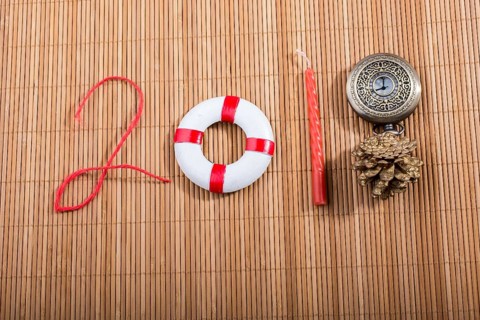 Happy Year 2018 decoration with life preserver, coins, cone and watch
