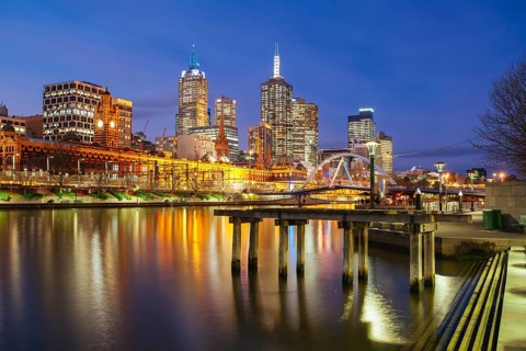 Melbourne, Australia, July 2 2013: Melbourne skyline along the Yarra River at dusk in Victoria