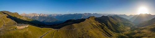 Morning atmosphere, aerial view, panorama at Colle Basset with Assietta ridge road, Sauze d'Oulx,