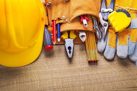 Set of construction tools in toolbelt