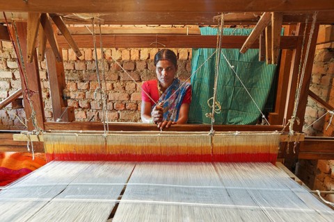 Woman weaving clothes on handloom, bastar, chhattisgarh, india, asia