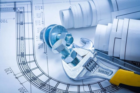Adjustable key spanner bolts nuts and construction drawings maintenance concept