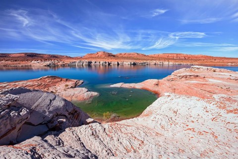 Lake Powell in the U.S. The coast is cut by narrow canyons. Grandiose huge lake of artificial