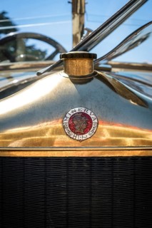 Lisbon, Portugal - Sep 29, 2024: Close-up of Minerva logo grille badge with Roman goddess profile
