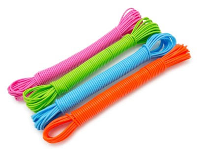 Hanks of colorful plastic linen ropes, over white