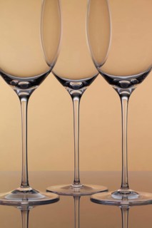 Three empty glasses of wine on a clean background
