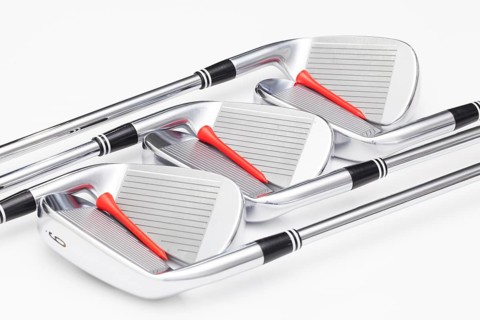 Titanium golf clubs on the white background