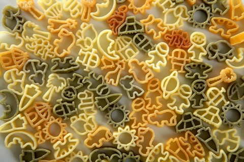 Italian children pasta texture, little multicolor shapes and flavour, good for background