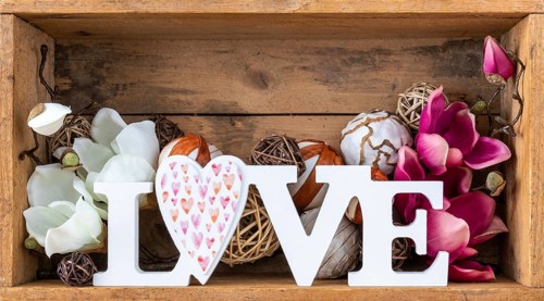 An image of a love decoration in a wooden box