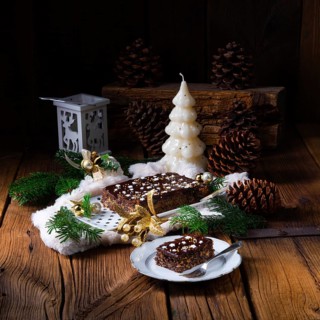 Christmas poppy seed cake with chocolate, nuts and sultanas