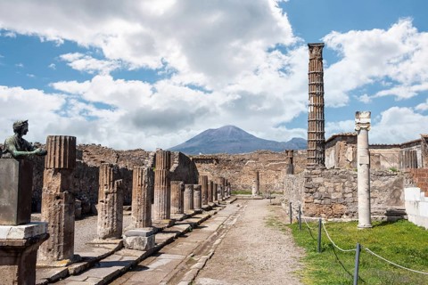POMPEII, ITALY, MAY 04, 2022, Colonnade and sculptures of the Temple of Apollo near the Pompeian
