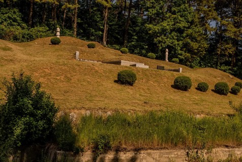 Daejeon, South Korea, May 26, 2019: Marked burial mounds in family graveyard located on forested